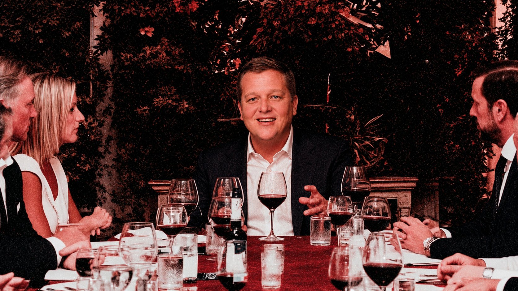 A long dinner table mid-conversation